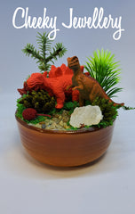 Cute Dinosaur themescape garden with green crystal and prehistoric greenery. Imagination play, creative play for kids. Great gift ideas.