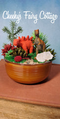 Cute Dinosaur themescape garden with green crystal and prehistoric greenery. Imagination play, creative play for kids. Great gift ideas.