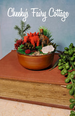 Cute Dinosaur themescape garden with green crystal and prehistoric greenery. Imagination play, creative play for kids. Great gift ideas.