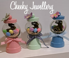 Gumball bunny jar.
Fuzzy green bunny in handmade gumball lolly jar.