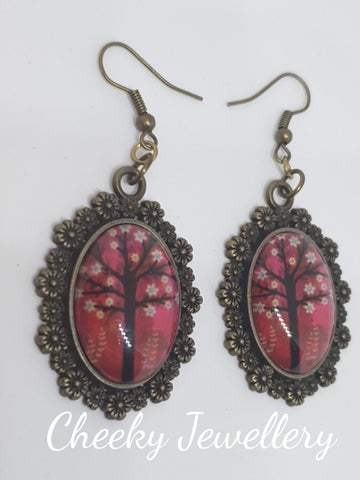 Tree of life earrings.