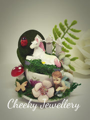 Pink Unicorn and fairy garden